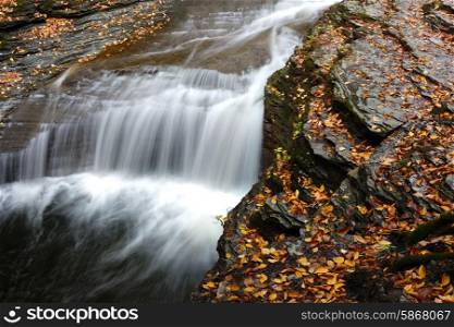 Autumn scene landscape of waterfalls at Buttermilk Falls State Park