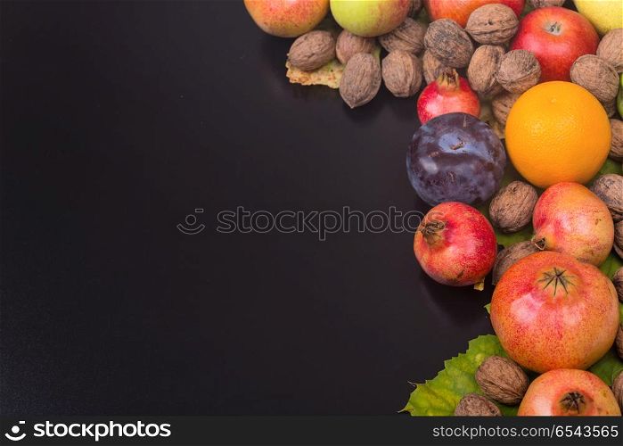 autumn still life, copy space, dark background, autumn composition from top. Free space for text. autumn fruits