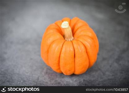 Autumn table setting with pumpkins holiday - Thanksgiving background decoration festive or halloween dark background