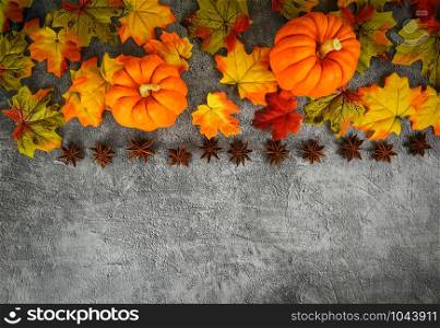 Autumn table setting with pumpkins holiday / Thanksgiving background frame autumn leaf and star anise spices decoration festive on wooden , top view copy space