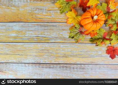 Autumn table setting with pumpkins holiday / Thanksgiving background frame autumn leaf decoration festive on wooden