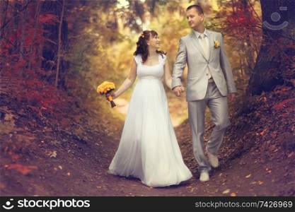 Autumn wedding bride and groom