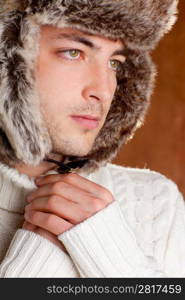 autumn winter man with brown fur hat portrait