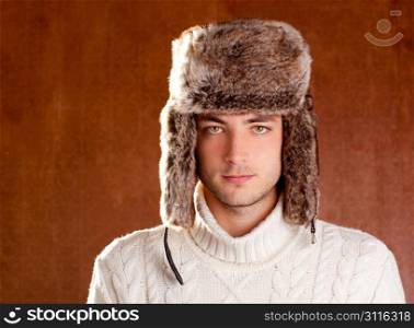 autumn winter man with brown fur hat portrait