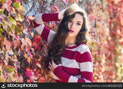 Autumn Woman Portrait. Beauty Fashion Model Girl with Autumnal Make up and Hair style. Fall