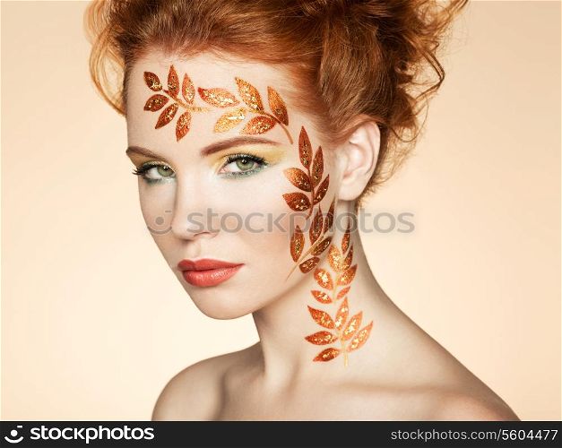 Autumn woman portrait with elegant hairstyle. Perfect makeup. Fashion photo