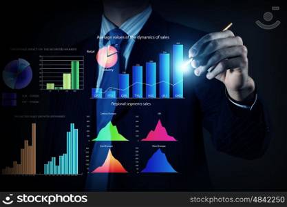 Average sales report. Close view of businessman drawing on screen market infographs