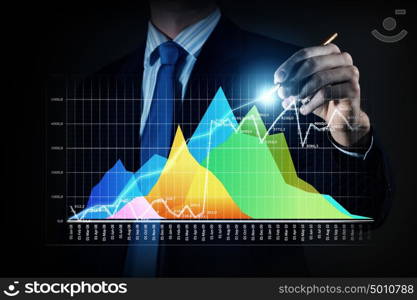 Average sales report. Close view of businessman drawing on screen market infographs