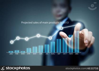 Average sales report. Close view of businessman touching screen with market infographs