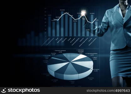 Average sales report. Close view of businesswoman drawing on screen market infographs