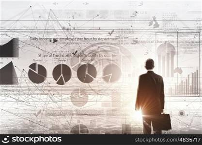 Average sales report. Rear view of businessman with suitcase and infographs on virtual panel