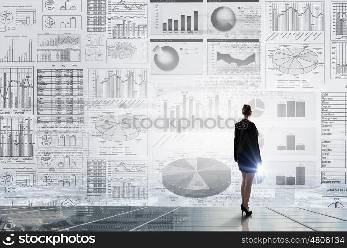 Average sales report. Rear view of businesswoman with suitcase and infographs on virtual panel
