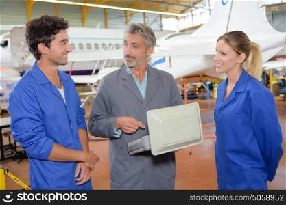 Aviation apprentices with tutor