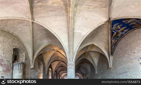 AVIGNON, FRANCE - JULY 21, 2017: Inside of Palais des Papes or Papal palace in Avignon, France in a beautiful summer day