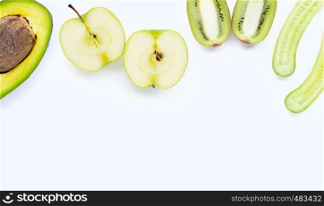 Avocado, green apple, kiwi, cucumber. Natural ingredients for homemade skin care on white background. Copy space