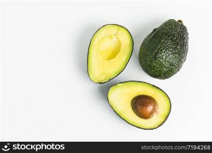 avocado on a dark wood background