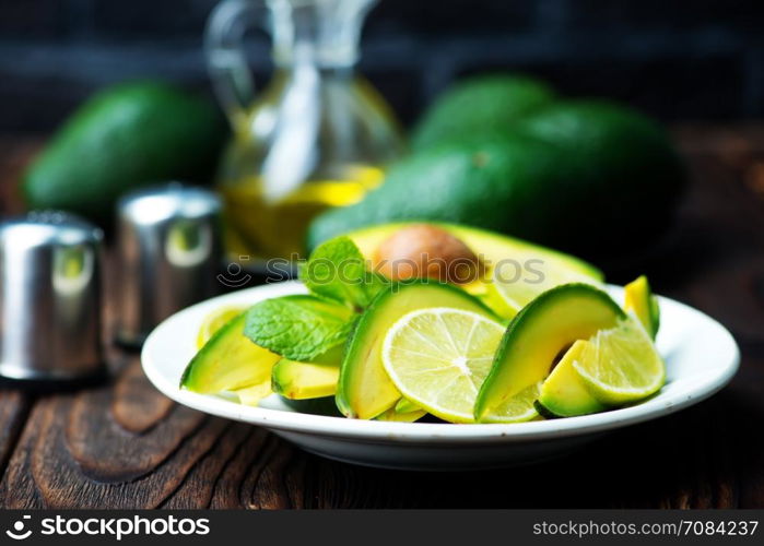 avocado salad on plate and on a table