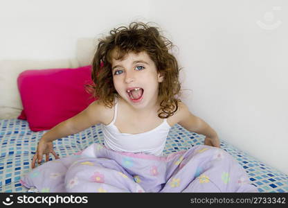 awakening girl yawning bed messy morning hair white room