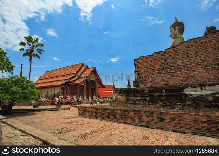 AYUTTHAYA THAILAND - SEPTEMBER8,2017 : thai student traveling to wat yai chai mongkol for on site historic studying,ayutthaya is one of unesco world heritage site in thailand