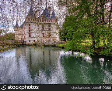 Azay le Rideau, France - April 17,2019: Chateau d'Azay-le-Rideau in Loire Valley, France. Castle of Azay-le-Rideau is one of the travel destinations in Europe. Scenic view of the French castle in spring.