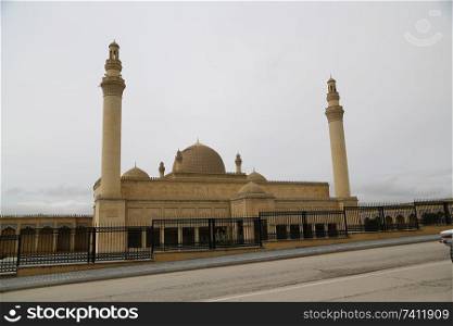 AZERBAIJAN, JUMA MOSQUE-CIRCA MAY 2019--unidentified people near the mosque