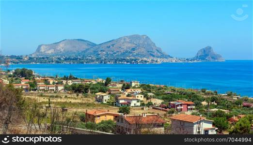 Azure Tyrrhenian sea bay and Rock of Capo Zafferano view from coastline highway road E90, Palermo region, Sicily, Italy