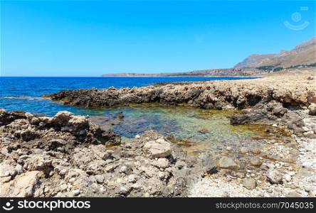 Azure Tyrrhenian sea picturesque bay and Cala di Punta Lunga rocky coast view, Macari, San Vito Lo Capo region, Sicily, Italy