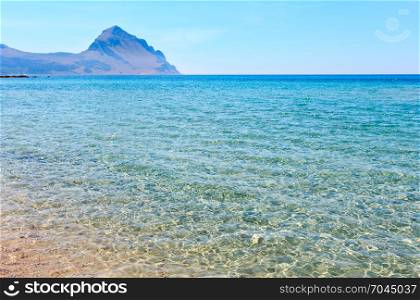 Azure Tyrrhenian sea picturesque bay and Monte Cofano mount view near Bue Marino Beach, Macari, San Vito Lo Capo region, Sicily, Italy
