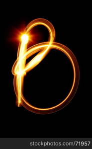 B - Created by light alphabet over black background