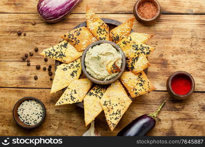 Babaganush or eggplant caviar from baked eggplant.Eggplant baba ganoush with flat bread. Baba ganoush,middle eastern cuisine