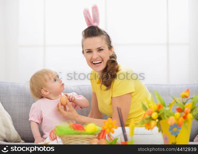 Baby and mother spending time together on Easter