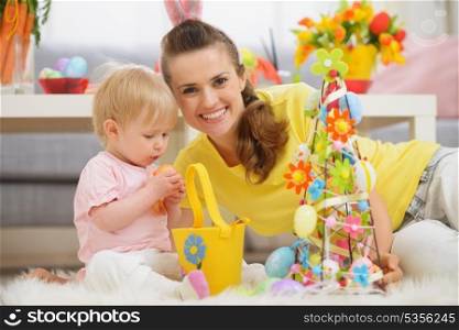 Baby and mother spending time together on Easter