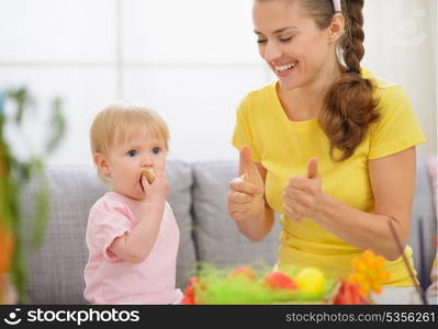 Baby and mother spending time together on Easter