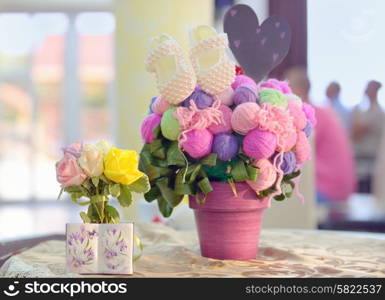 Baby baptism decorations on table