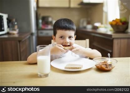 baby boy having breakfast home