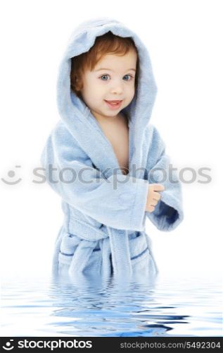 baby boy in blue robe in water