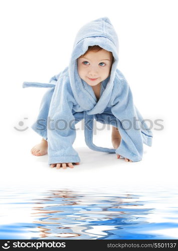 baby boy in blue robe over white