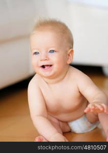 Baby boy with blue eyes portrait