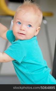 Baby boy with blue eyes portrait