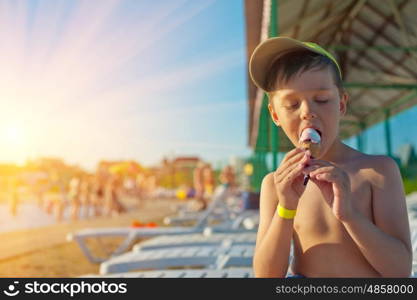 Baby boy with ice-cream. Baby boy with ice-cream at the beach
