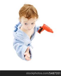 baby boy with toy drill over white