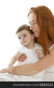 baby brunette and redhead mother love hug on white