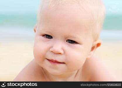 Baby close up on a beach