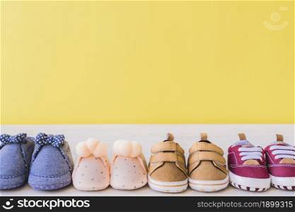 baby concept with different pairs shoes. Resolution and high quality beautiful photo. baby concept with different pairs shoes. High quality beautiful photo concept
