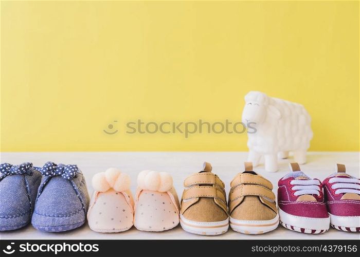 baby concept with four different pairs shoes