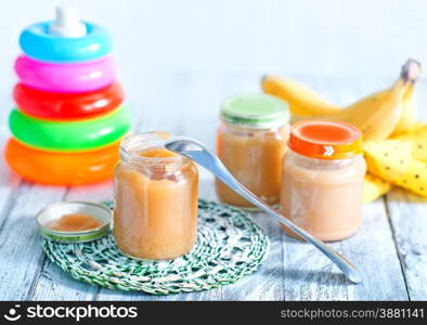 baby food in bank and on a table