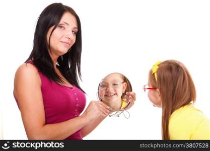 baby girl mother looking in mirror isolated