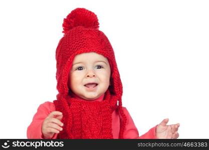 Baby girl with a funny wool red hat isolated on white background