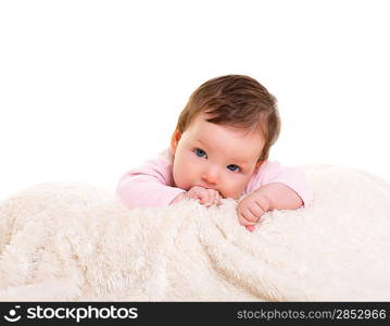 baby girl with toothache in pink with winter white fur background