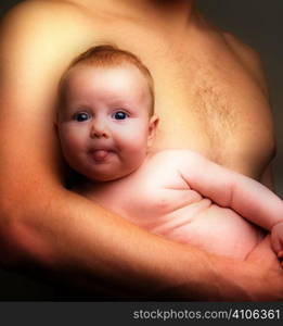 Baby Held By Father